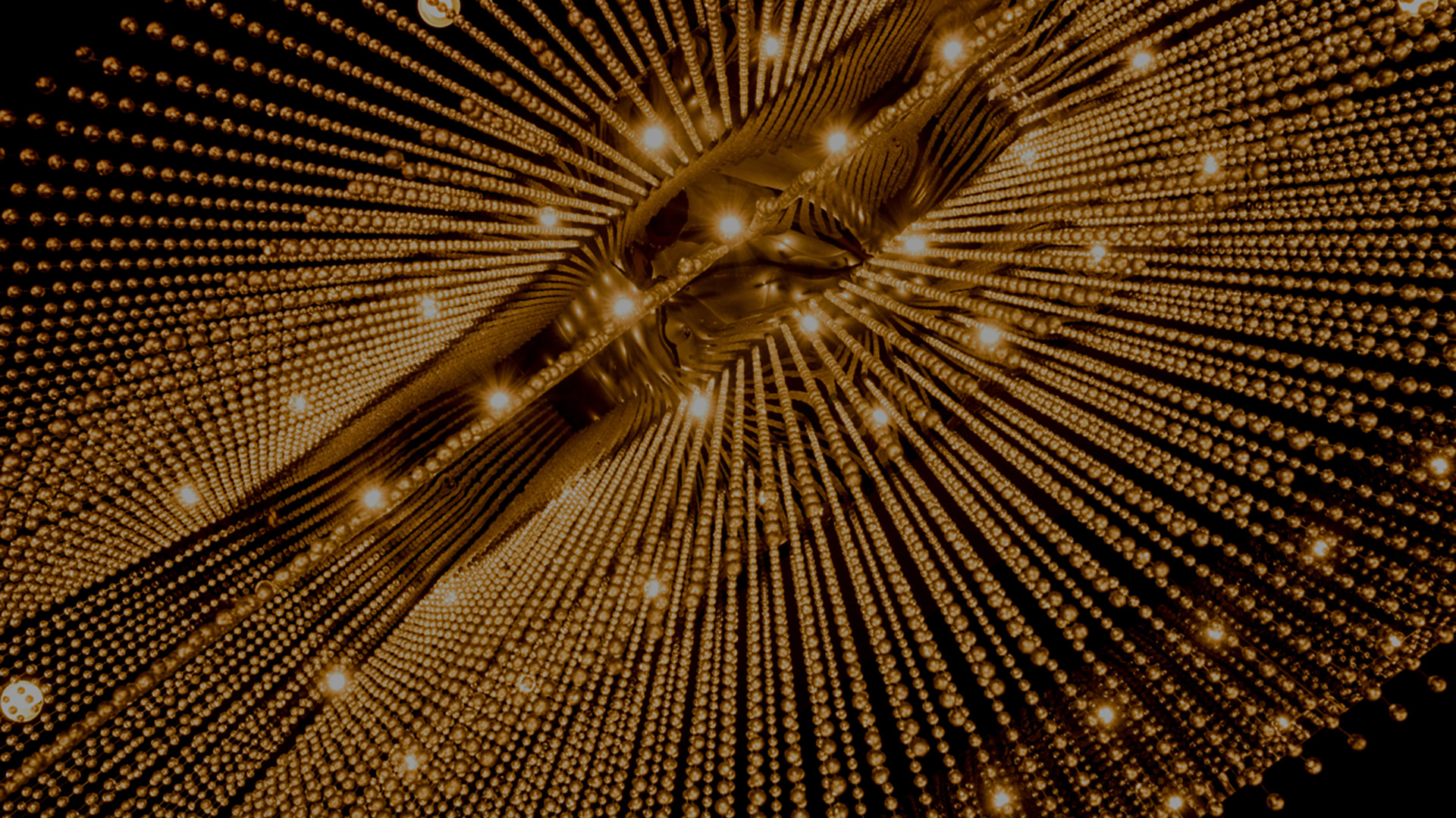 Abstract golden light pattern representing the intricate details of Houston web design